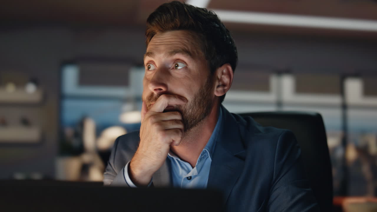 Closeup angry director yelling videocall evening interior. Man gesturing hands