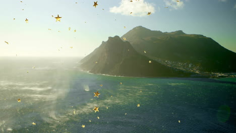 mountain peninsula being animated extending into turquoise ocean, floating golden star confetti