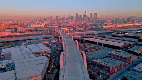 downtown los angeles arts district morning, slow drone descent over sixth street bridge