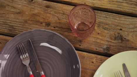 various cutlery on wooden table 4k