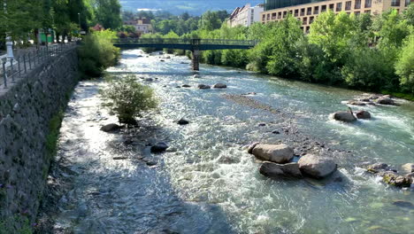 flowing river passer in meran, south tyrol, italy slow motion