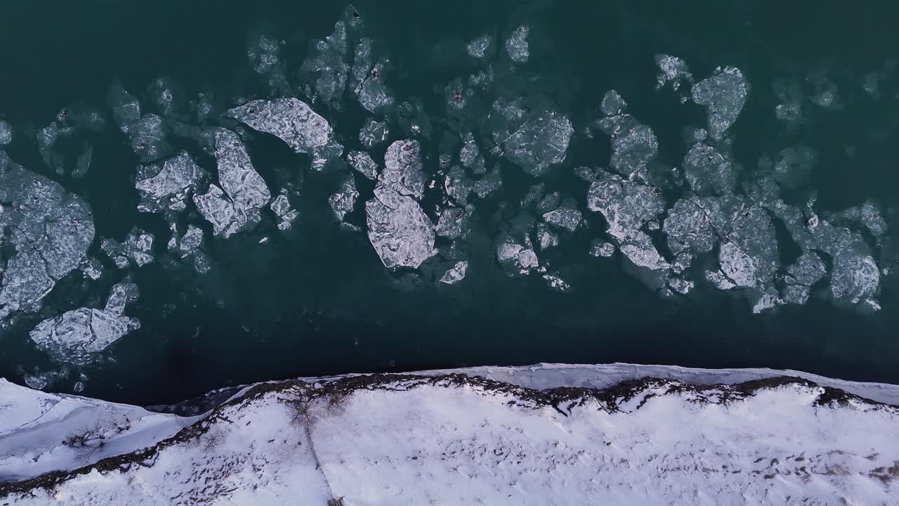Ice Melted And Floating Over Calm River In South Iceland. Aerial Topdown Shot
