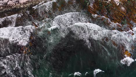 abstract majestic top down view of waves washing over cape point reef