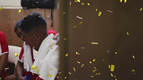 Animation-of-confetti-falling-over-football-players-in-changing-rooms