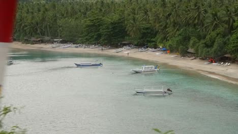 panning shot of outriggers in indonesia