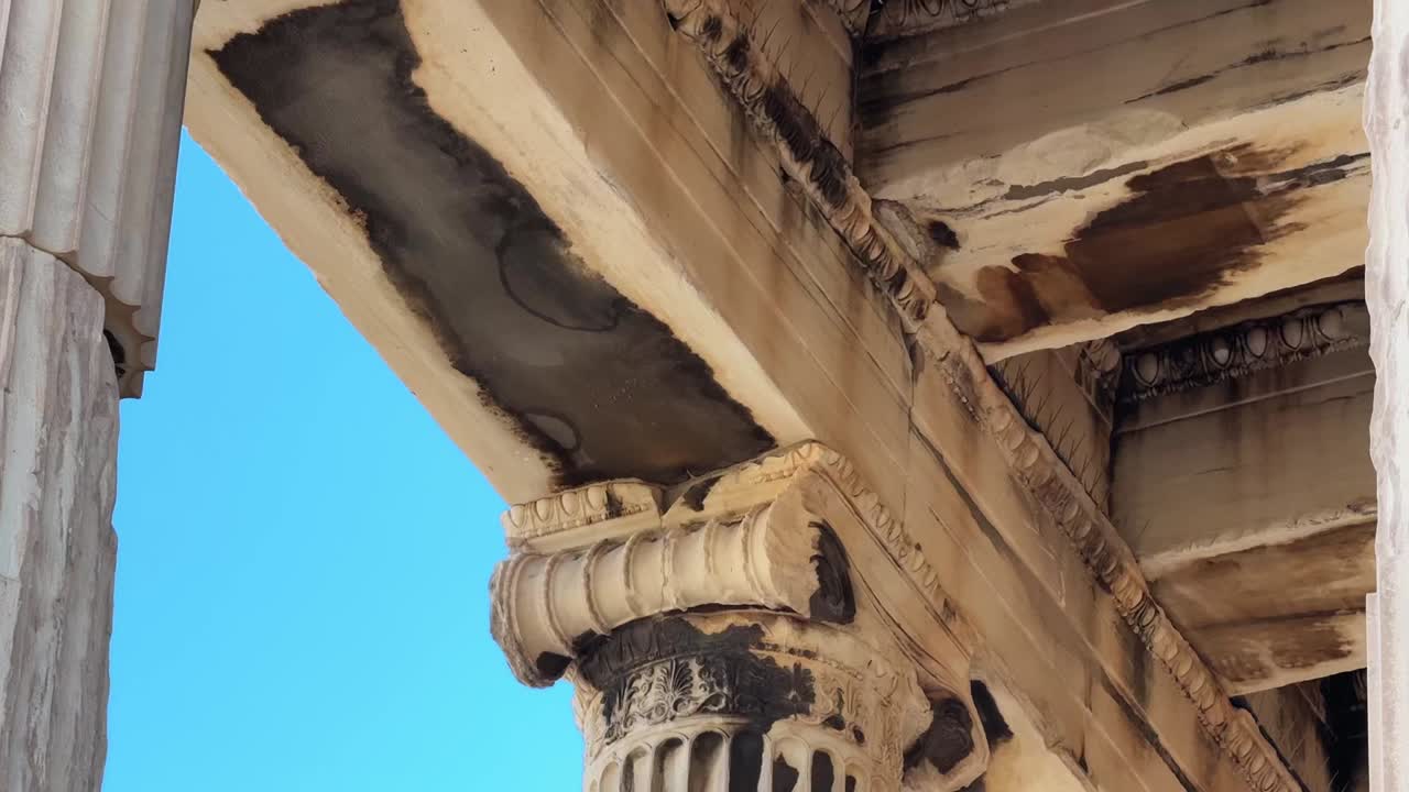 A close-up view of the Parthenon's intricate architecture and details under the summer sun.