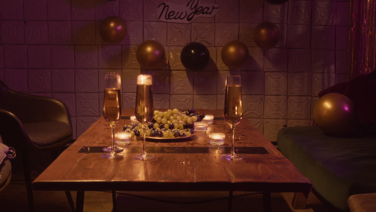 New Year's Eve Celebration with Champagne and Grapes