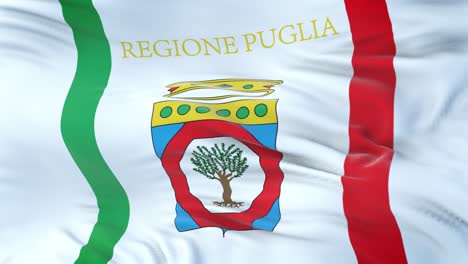 apulia (región de italia) bandera ondeando en el viento con textura de tela muy detallada. bucle sin costuras