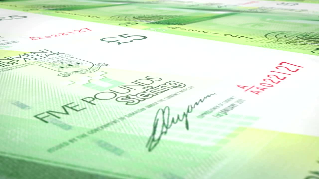 billetes de cinco libras esterlinas de gibraltar enrollado, dinero en efectivo, bucle