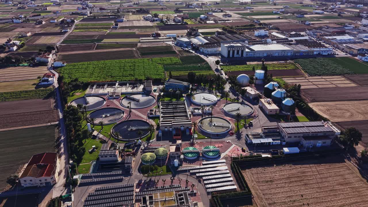 Water treatment facility in rural Spain surrounded by farmland