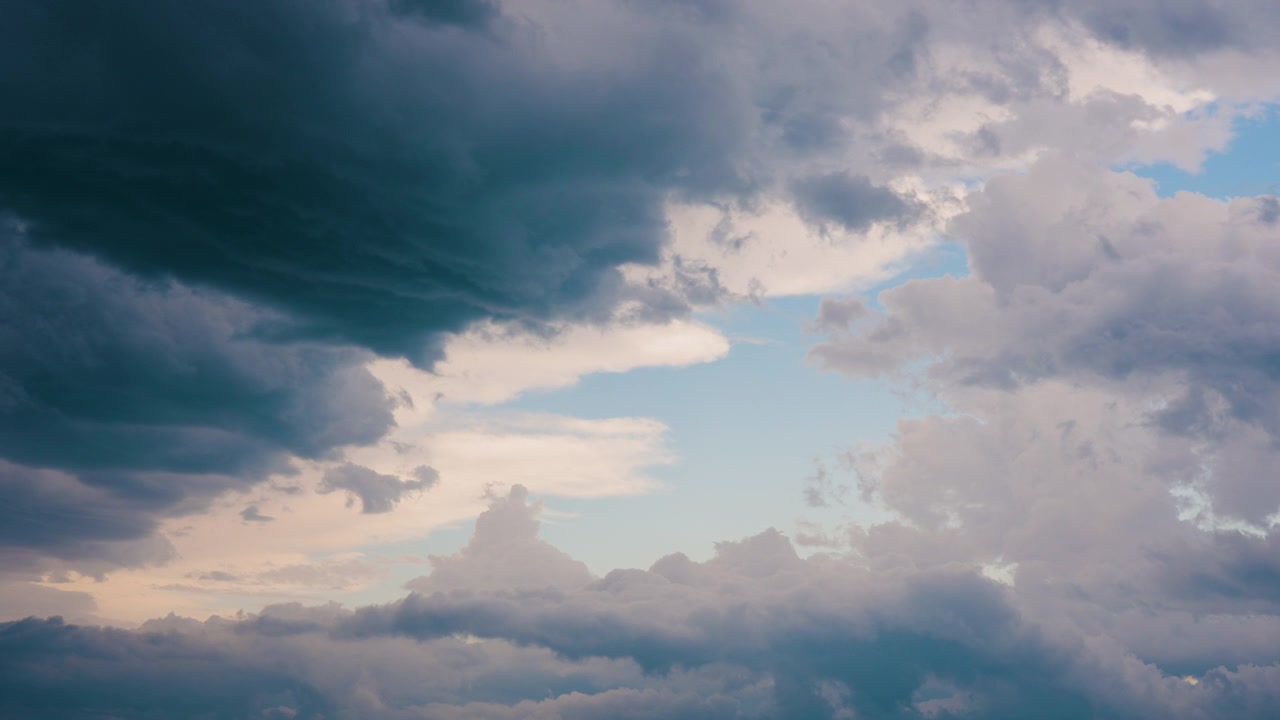 Scenic clouds drifting across sky in seamless looping background