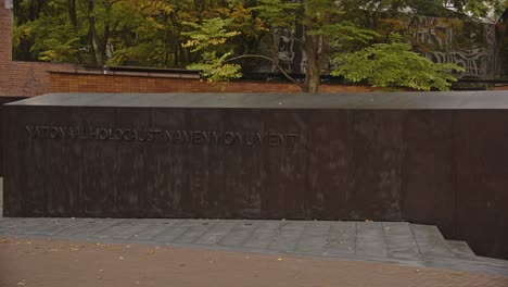 pan past stone slate of the national holocaust names memorial in amsterdam, the netherlands