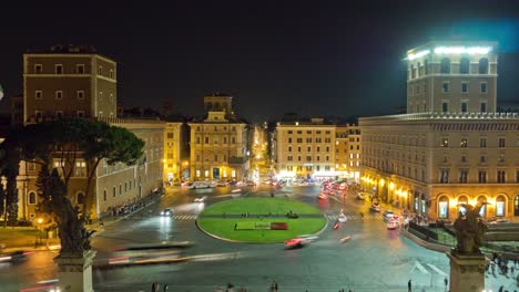 italy night illumination rome city square piazza venezia traffic circle panorama 4k time lapse