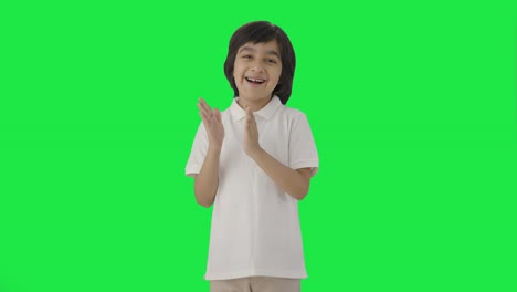 Happy-Indian-boy-clapping-and-appreciating-Green-screen