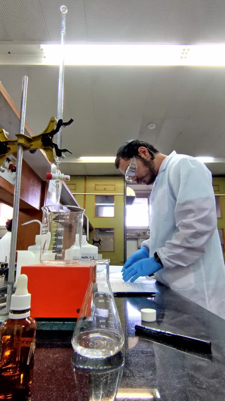 Male Researcher in Protective Glasses
