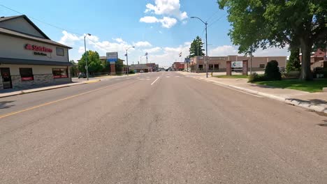 driving through a small town in the american midwest
