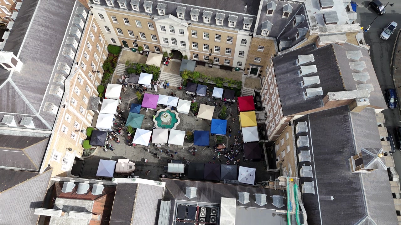 Overhead birds eye aerial view Colourful Outdoor Market Stalls in Richmond Town Centre UK