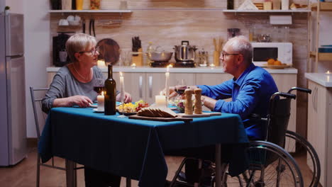 man with disabilities talking with wife