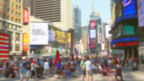 blurred view of times square, nyc