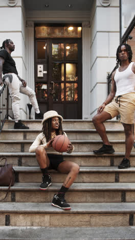 urban youth in streetwear with basketball