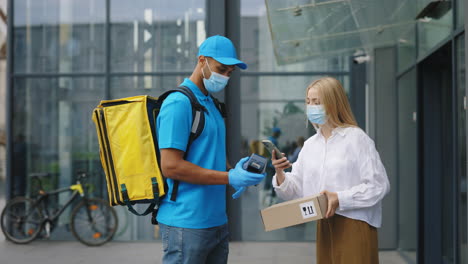 delivery person and customer exchange package