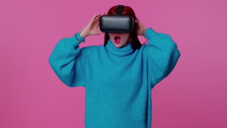 Girl-using-virtual-reality-futuristic-technology-VR-headset-helmet-to-play-simulation-3D-video-game