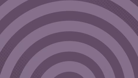 Circles-forming-in-hypnotic-motion-against-purple-background