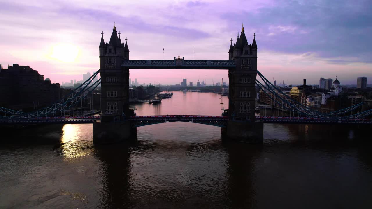 Aerial View, Silhouette of Tower Bridge Above Thames River at Dusk Over London, England UK