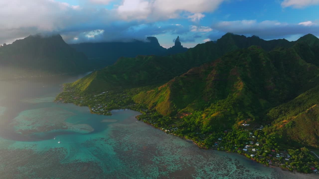 Aerial View of Tropical Island Bay with Lush Mountains