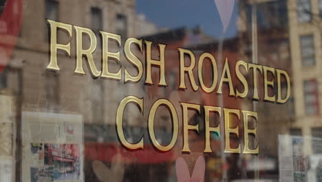 fresh roasted coffee sign in a city store