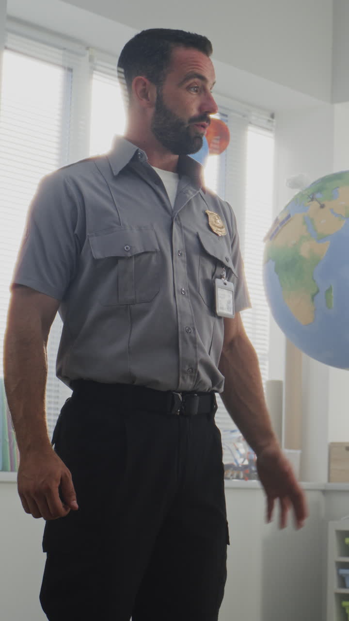 Male Policeman Giving Lecture to Curious Primary School Students About Safety Rules