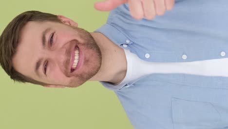 portrait caucasian teenager guy showing thumb up like gesture good exams result successful study in portrait caucasian teenager guy showing thumb up like gesture good exams result successful study in school college library teen boy happy smiling recommend education studying learning approve hand hig