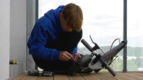 Boy turns the screws