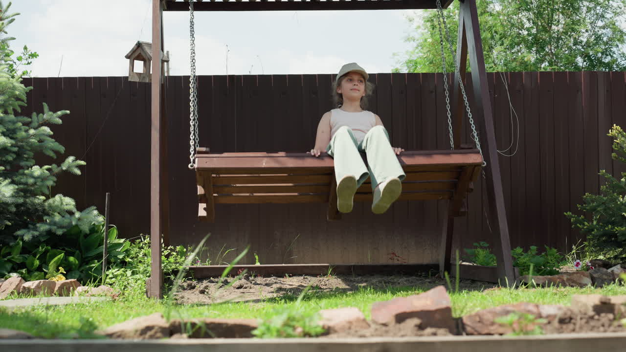 Lady Calmly Seated Amid Garden Surroundings, Female Individual Relaxing On Porch Steps Near Greenery, Woman In Casual Attire Meditates Peacefully Amidst Suburban Garden Scenery With Fence