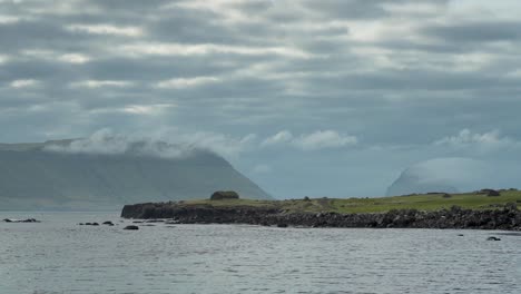 Gloomy-Cloudscape-Over-The-Islands-Koltur-And-Hestur-In-Faroe-Islands,-Denmark