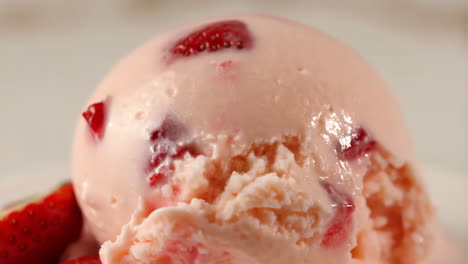 close-up of strawberry ice cream scoop