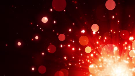 bokeh de oro rojo brillante en un fondo oscuro, luz mágica, glamour, vacaciones. partículas de brillo rojo. hermosa animada navidad, fondo del día de san valentín. tesoro mágico brillante. bucle sin costuras