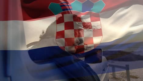 animation of croatia flag over thoughtful african american woman looking through vehicle window