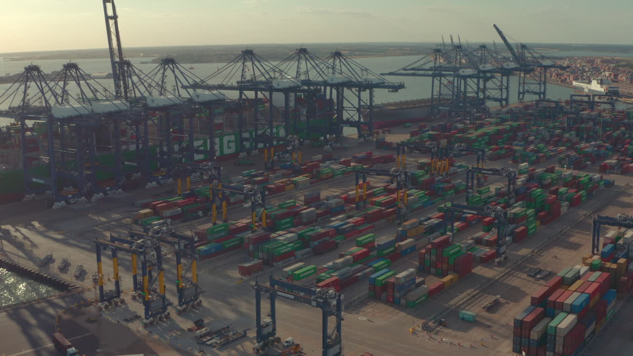 Wide rising and establishing aerial shot of Port of Felixstowe UK