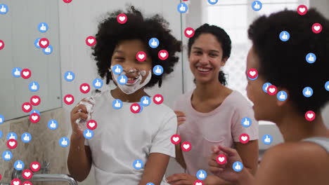 Animation-of-emoji-icons-over-biracial-family-smiling-in-bathroom