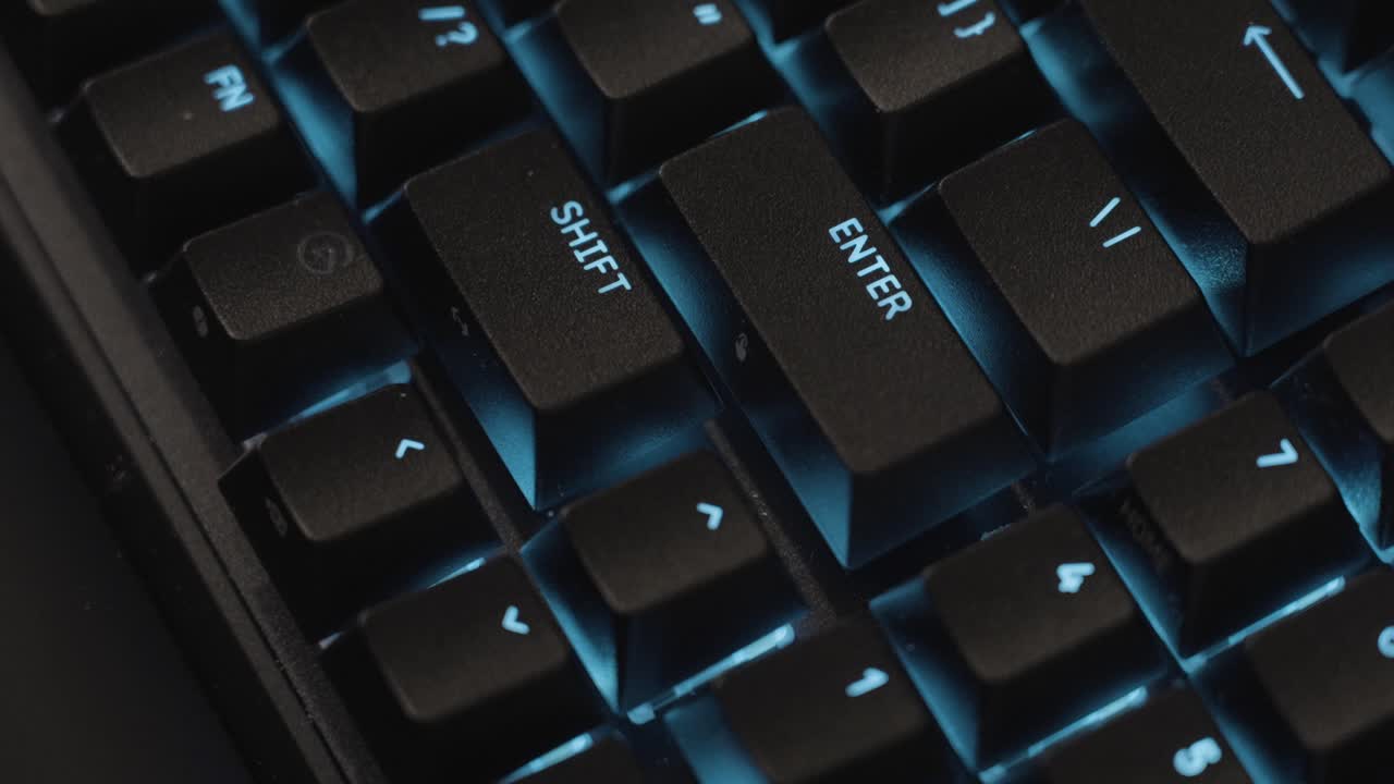 Passing slowly and smoothly in extreme close up over the RGB illuminated keys