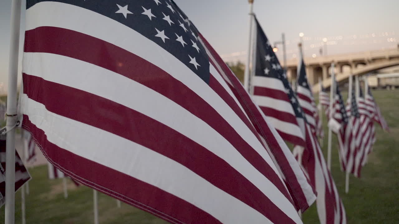 Slow Motion Memorial Day Celebration Flags Flapping in Front of Camera