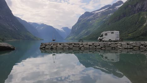 scenic norwegian fjord with campervan