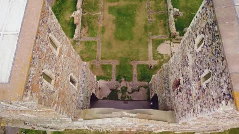 a beautiful drone aerial over the reculver towers an abandoned abbey in kent england 2