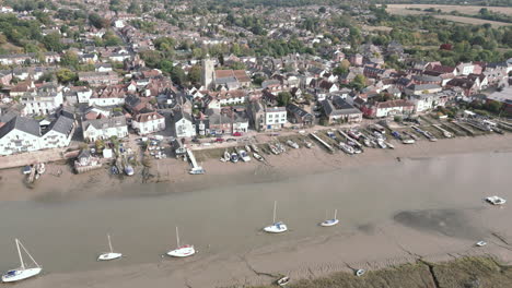 high viewpoint aerial footage of wivenhoe village in essex, looking down with sideways motion