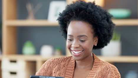 Happy-black-woman-relaxing-at-home-on-the-weekend