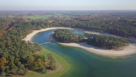 Aerial-drone-view-of-the-tropical-paradise-recreational-place-the-Henschotermeer-in-Utrecht-the-Netherlands,-Europe