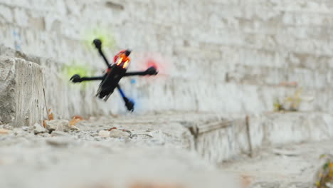 a sports drone hits a wall and crashes unsuccessful maneuver