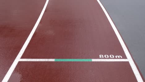 athletics track in the stadium. the ground marks 800m.