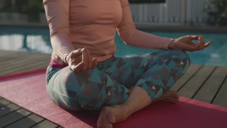 Senior-woman-outdoor-yoga-fitness